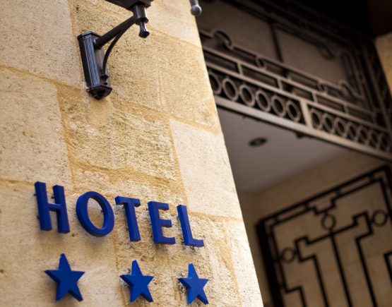 Facade of a three stars hotel in the city